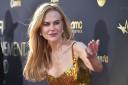 Nicole Kidman wore a glittering golden gown for the ceremony (Jordan Strauss/Invision/AP)