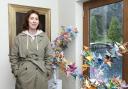 COMPLETE: Artist Beverly McNeil with the art installation