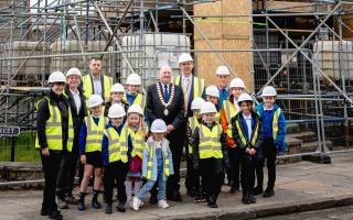 REPAIRS: Provost Donald Balsillie and kids from Clackmannan PS at the tolbooth site.