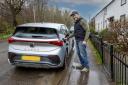 CHARGE: Stirling resident Stephen Gordon is the first in Scotland to have the through-pavement channel solution trialled for home EV charging
