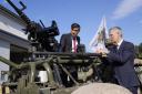 NATO Secretary General Jens Stoltenberg (right) and Prime Minister Rishi Sunak inspect weaponry at the Warsaw Armoured Brigade in Warsaw, Poland. Picture date: Tuesday April 23, 2024.