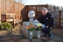 Alan with John's memorial, which sits behind Alloa Fire Station