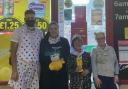 Staff and management at Coalsnaughton's Premier Express issued a thank you to customers after they raised £1,200 for Children in Need
