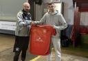SIGNED: Marc Sludden pictured with assistant manager Darren Cummings.