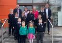 Councillor Graham Lindsay with staff and pupils from Alva PS.