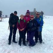 It took the group more than 10 hours to reach the top but it was worth it as they've raised more than £1,600 for charity