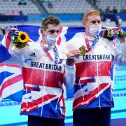 Duncan Scott (left) and Tom Dean (right) with their medals after the Men's 200m Freestyle Final at the Tokyo Aquatics Centre Picture by Adam Davy/PA Wire.