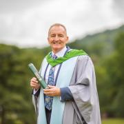 HONOUR: Grant Reid, who grew up in Kincardine and went on to become the CEO of Mars Inc, received his honourary degree from the University of Stirling last week