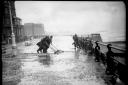 Cleaning up Hove promenade after stormy seas in 1938. Photos: East Sussex Record Office/The Keep (ARG/3/3059V)