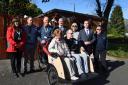 Henry Gill (in the saddle) pictured with dignitaries and supporters when the trishaw service launched in 2019