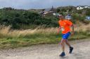 LORD OF THE ISLES: Despite only taking up running during Covid, Alloa's Neil Bell, 53, completed three half marathons to claim the title