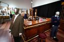 The bar used on the set of the television series Cheers went under the hammer at an auction in Dallas (AP Photo/Tony Gutierrez)