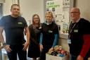 PARTNERSHIP: Lauren Douglas from Alloa's Yorkshire Building Society branch with representatives of Alva Food Larder collecting the donations