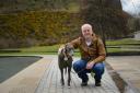 ANIMIAL LOVER: Mark Ruskell, pictured with his staffer's Greyhound Bluesy, has campaigned for animal rights in the past.