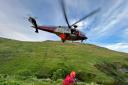 CALL OUT: Volunteers from Ochils Mountain Rescue Team assisted a casualty at Alva Glen as she was airlifted to hospital - Pictures courtesy of Ochils Mountain Rescue Team