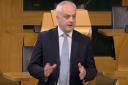 Green MSP Mark Ruskell taking part in a Holyrood debate.