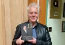 FAMILY HISTORY: Brian Jameson with the book he has written about John Jameson. Picture courtesy of Brian Jameson