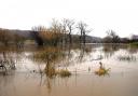 Flooding caused by the River Devon bursting its banks.