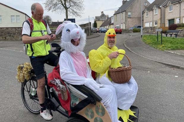 The Easter Bunny and the chick delighted children around the town as they took on a trishaw ride