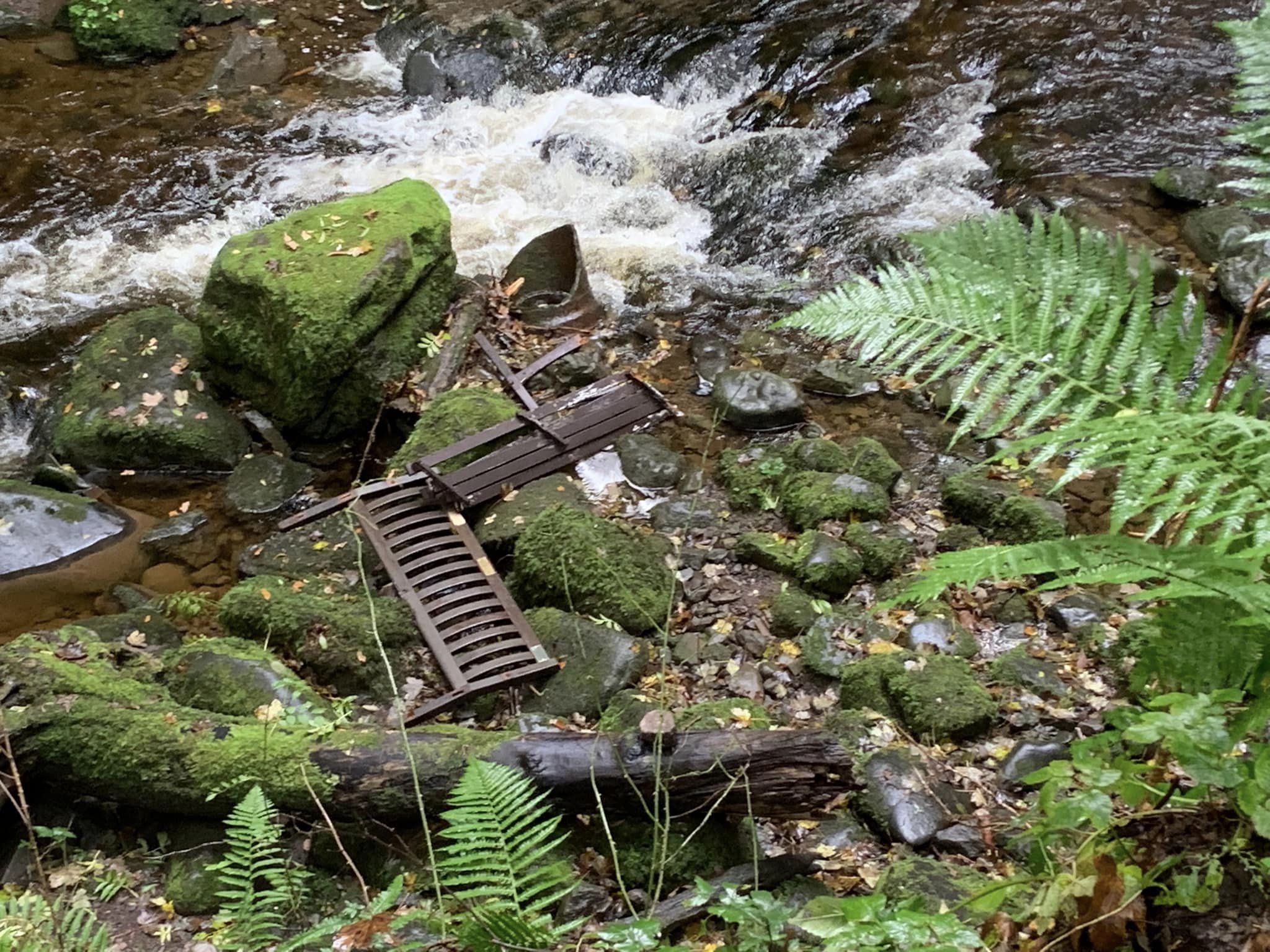 HEARTBREAK: The memorial bench was thrown into the burn below where it shattered into pieces on the rocks