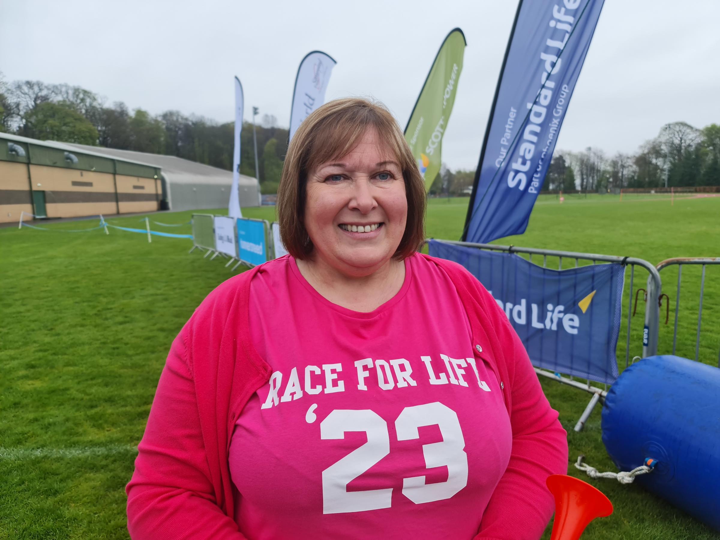 Fiona Conaghan sounded the horn to start the Race for Life in memory of her son, Stuart Hutchison. Pictures by Race for Life.