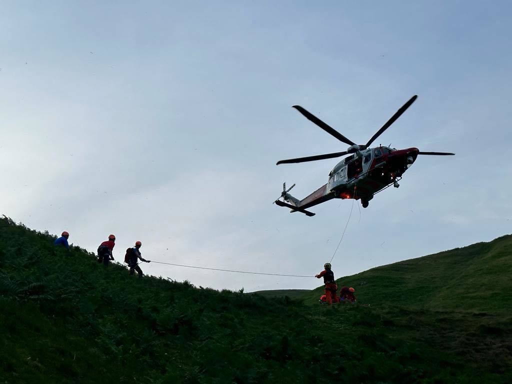 CALL OUT: Volunteers from Ochils Mountain Rescue Team assisted a casualty at Alva Glen as she was airlifted to hospital - Pictures courtesy of Ochils Mountain Rescue Team