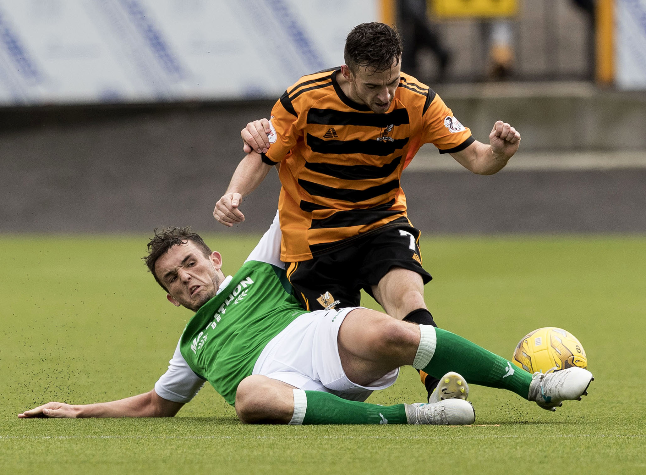 Cawley up against John McGinn. Picture from SNS