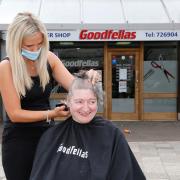 FOR THE CAUSE: Carol Anne had her head shaved in Tron Court last Friday to raise money for Macmillan nurses. Picture by John Howie