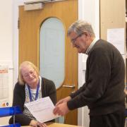 AGM: Session supervisor Senga Awlson with volunteer Steve Hall as the annual report was presented