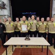 RETIREING: Rab McAinsh at his retirement presentation with Tilly fire crew.