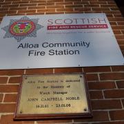 The plaque to John Noble outside Alloa Fire Station