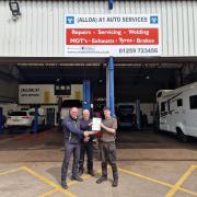 SUCCESS: Andrew McDuff, A1 Autos owner Jim McEwan and modern apprentice Callum Lee Williamson who successfully completed his modern apprenticeship