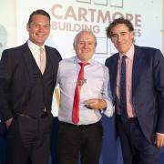 AWARD: Gordon Banks receives the award on behalf of Cartmore.