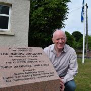 MINING LEGACY: Former miner Jim Tierney at the Miners' Memorial in Sauchie pictured in 2020 when the Scottish Government made recommendations to pardon many miners involved in the strikes in the 1980s which Clacks felt the full brunt of