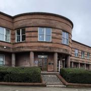 The accused appeared via video link for the hearing at Falkirk Sheriff Court