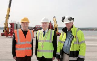 TOUR: Murdoch McGregor and Provost Donald Balsillie toured the Terra Marique with owner Peter Wynn as it took on another load bound for Alloa
